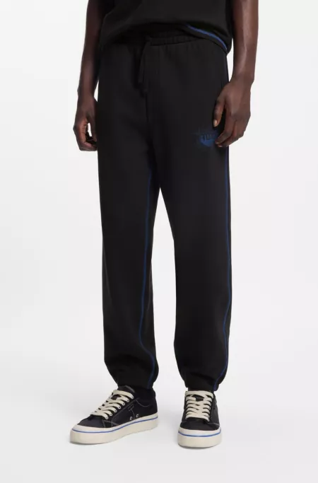 Cotton-terry tracksuit bottoms with logo and contrast stitching