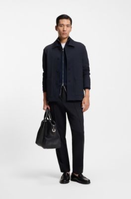 Tapered fit-byxor i performance stretch-tyg, M&ouml;rkbl&aring;