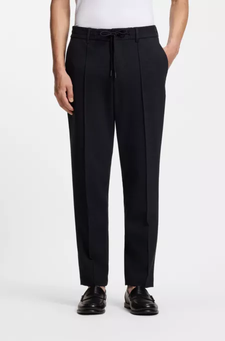 Tapered-fit trousers in performance-stretch fabric