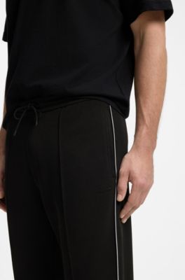 Cotton-blend tracksuit bottoms with piping details, Black