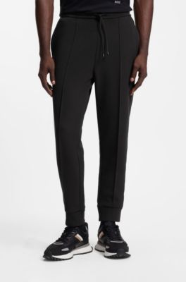 Cotton-blend tracksuit bottoms with piping details, Black