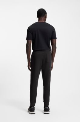 Cotton-blend tracksuit bottoms with piping details, Black