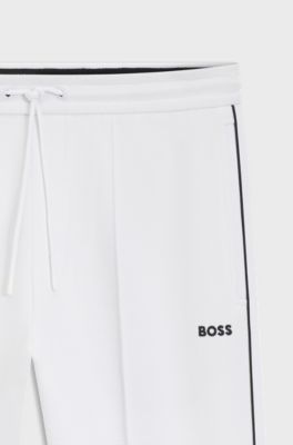 Cotton-blend tracksuit bottoms with piping details, White