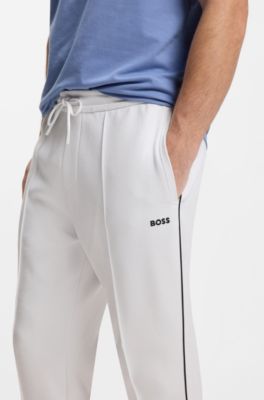 Cotton-blend tracksuit bottoms with piping details, White
