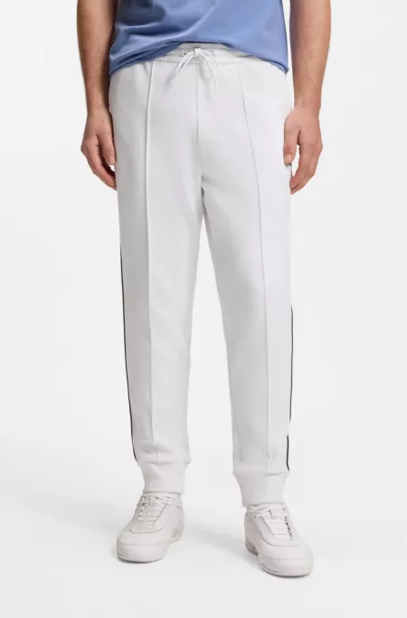 Cotton-blend tracksuit bottoms with piping details
