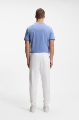 Trainingsbroek van een katoenmix met biezen, Wit