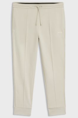 Cotton-blend tracksuit bottoms with piping details, Natural