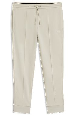 Cotton-blend tracksuit bottoms with piping details