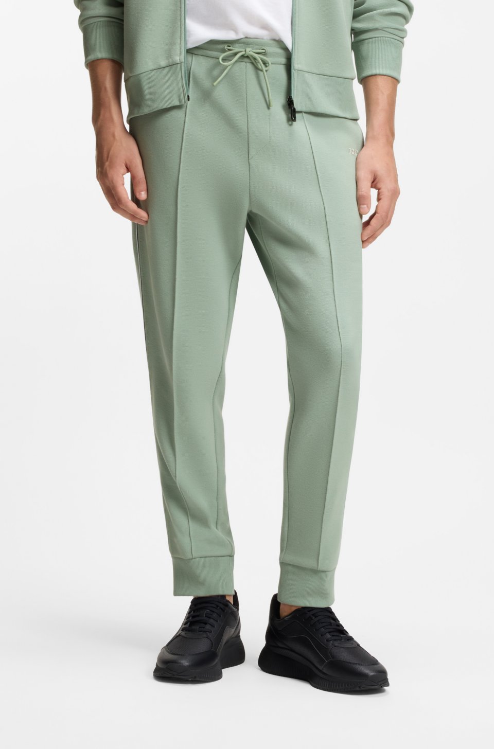 Cotton-blend tracksuit bottoms with piping details