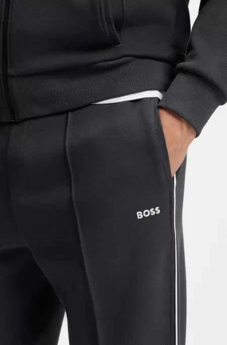 Cotton-blend tracksuit bottoms with piping details