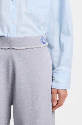 Cotton-terry tracksuit bottoms with logo waistband, Light Grey