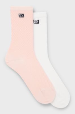 Two-pack of regular-length socks with stacked logos, light pink