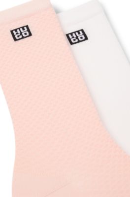 Two-pack of regular-length socks with stacked logos, light pink