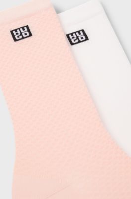 Two-pack of regular-length socks with stacked logos, light pink