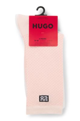 Two-pack of regular-length socks with stacked logos, light pink