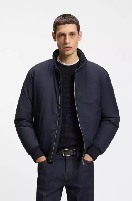 Water-repellent jacket with logo badge