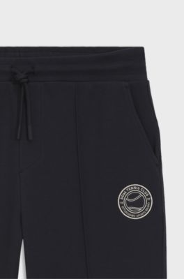 Pantaloni della tuta in misto cotone con logo ispirato al tennis, Blu scuro