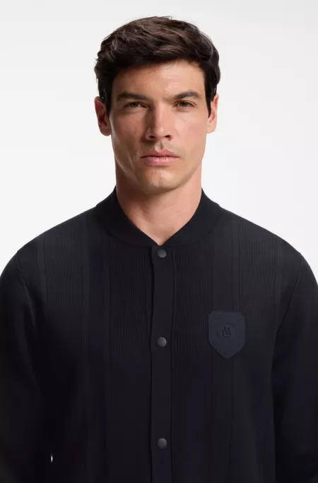 Knitted cardigan with crest logo