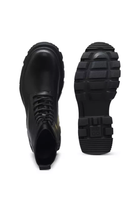 Lace-up leather boots with chunky sole