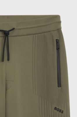 Regular-fit tracksuit bottoms with jacquard stripes, Olive