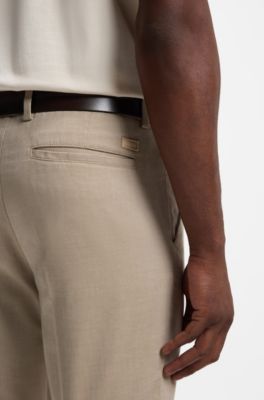 Slim fit-byxor i stretchig bomullsdobby, Beige