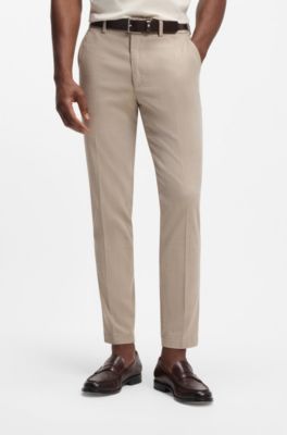 Slim fit-byxor i stretchig bomullsdobby, Beige
