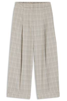 Oversized-fit trousers in checked stretch wool 1