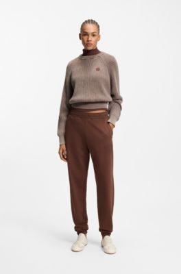 Loose-fit cotton-terry tracksuit bottoms with logo artwork, Brown