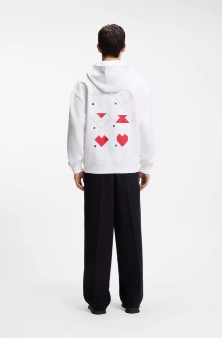 All-gender Cotton-terry hoodie with origami-heart artwork