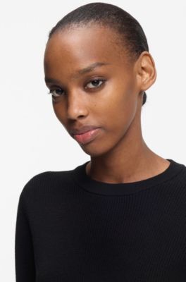 Cotton sweater with detachable floral brooch, Black