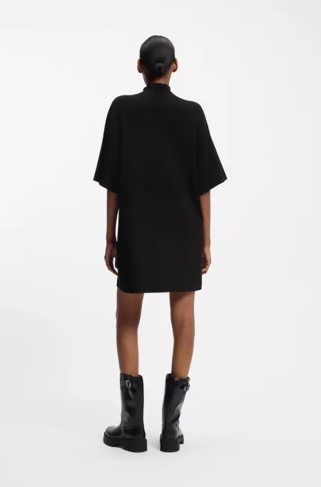 Knitted dress with silicone logo badge