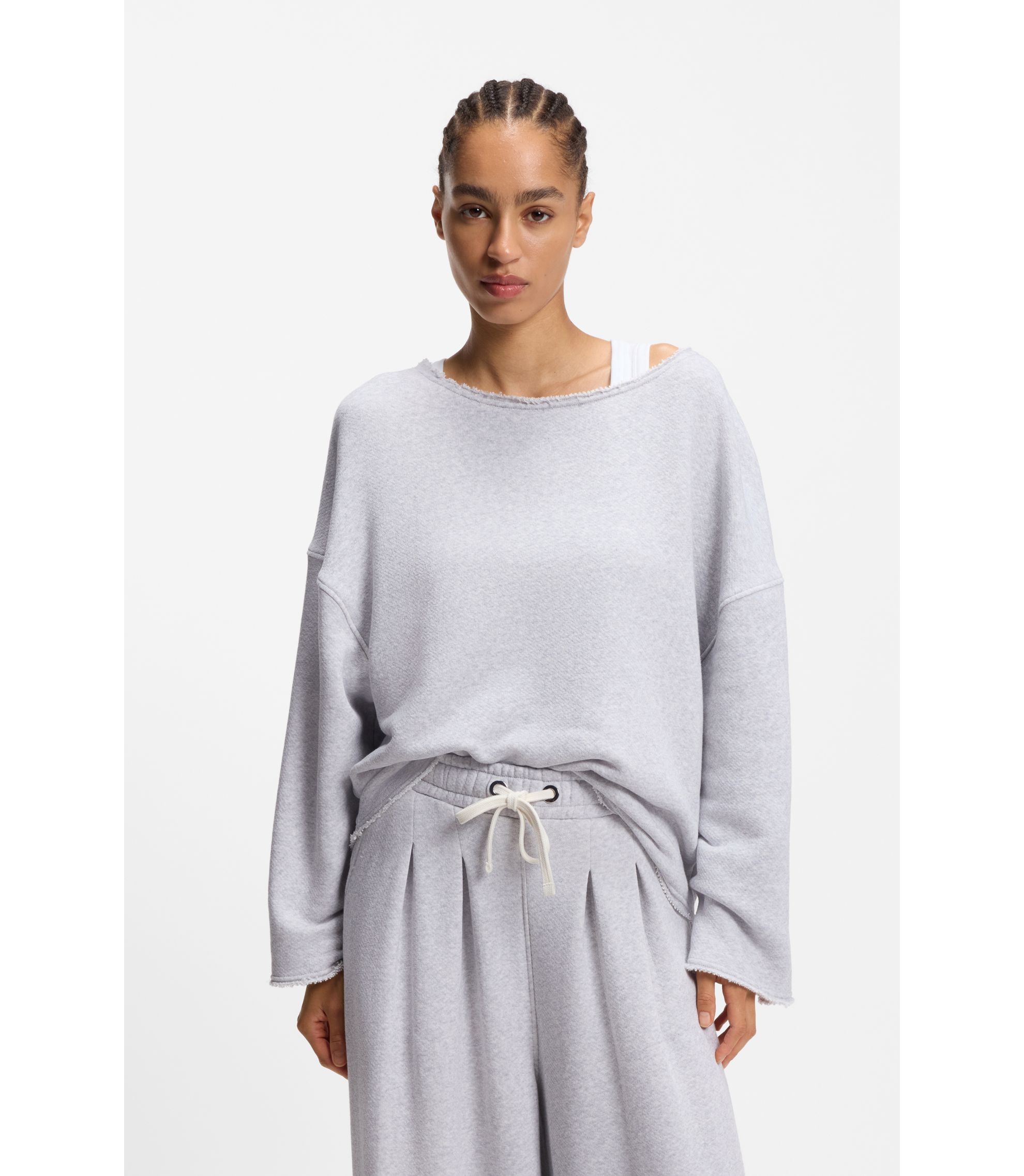 Loose-Fit Sweatshirt aus Baumwoll-Mix mit unversäuberten Säumen