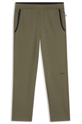 Regular-fit tracksuit bottoms in super-soft stretch fabric, Olive