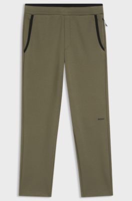 Regular-fit tracksuit bottoms in super-soft stretch fabric, Olive