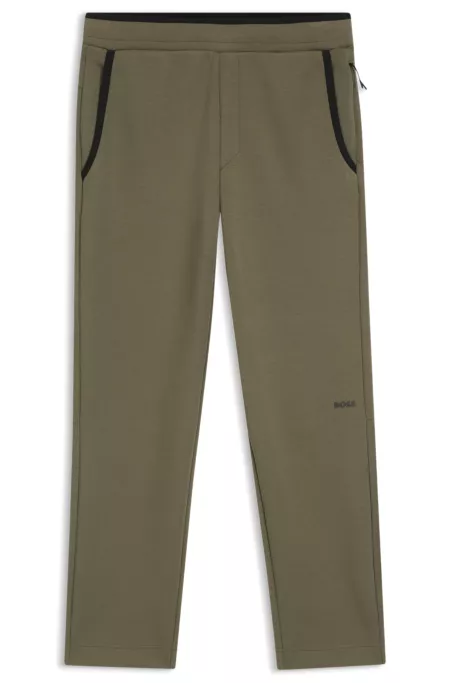 Regular-fit tracksuit bottoms in super-soft stretch fabric