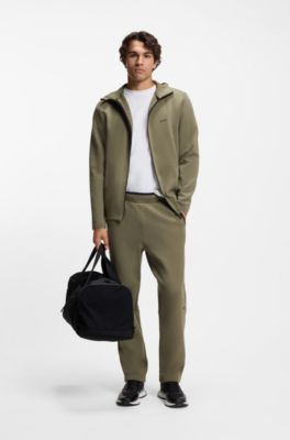 Regular-fit tracksuit bottoms in super-soft stretch fabric, Olive