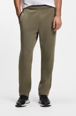 Regular-fit tracksuit bottoms in super-soft stretch fabric, Olive