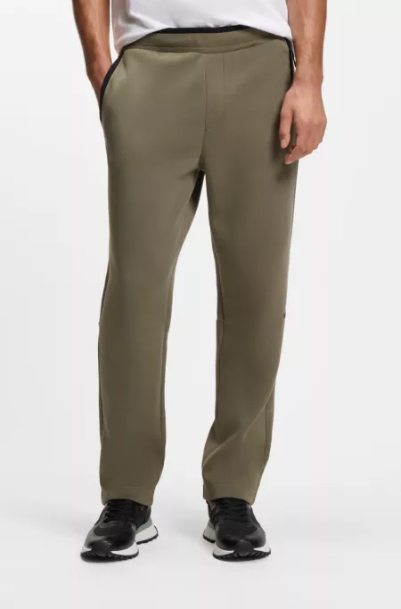 Regular-fit tracksuit bottoms in super-soft stretch fabric
