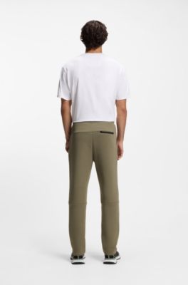Regular-fit tracksuit bottoms in super-soft stretch fabric, Olive
