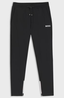 Stretch-gabardine tracksuit bottoms with zipped hems, Black