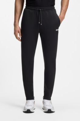 Stretch-gabardine tracksuit bottoms with zipped hems, Black