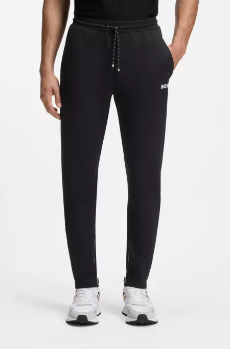 Stretch-gabardine tracksuit bottoms with zipped hems