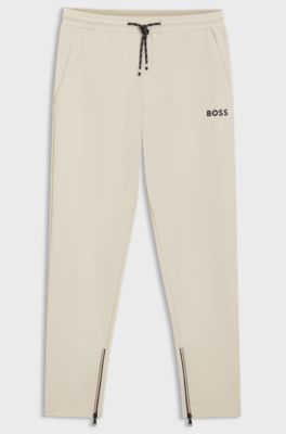 Active Stretch-gabardine tracksuit bottoms with zipped hems, Natural