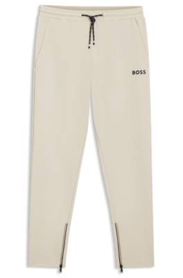 Active Stretch-gabardine tracksuit bottoms with zipped hems 1