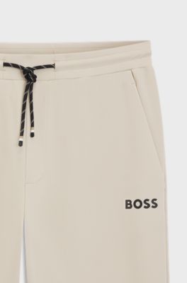 Active Stretch-gabardine tracksuit bottoms with zipped hems, Natural