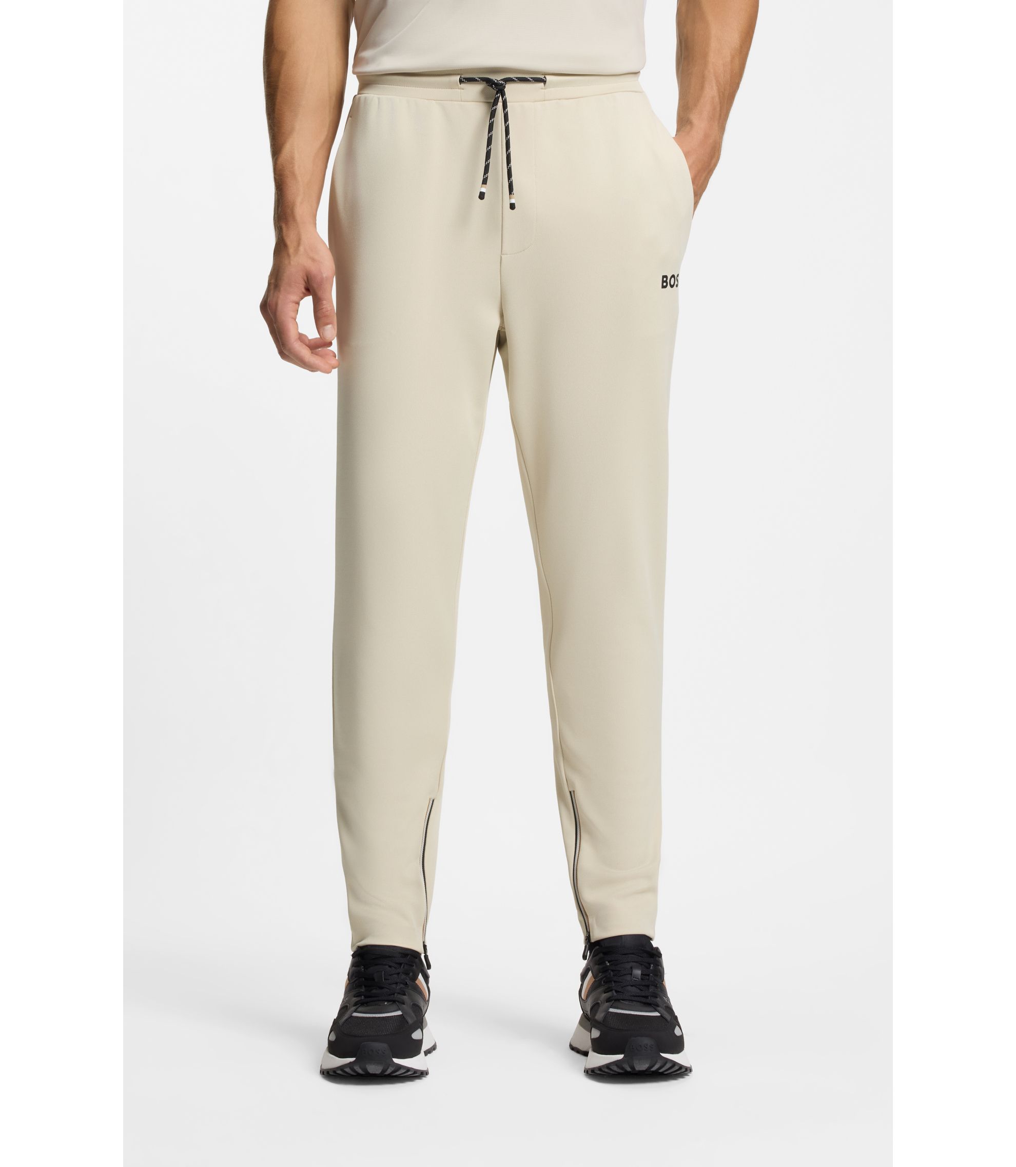 Jogginghose aus Stretch-Gabardine mit Reißverschlüssen an den Säumen