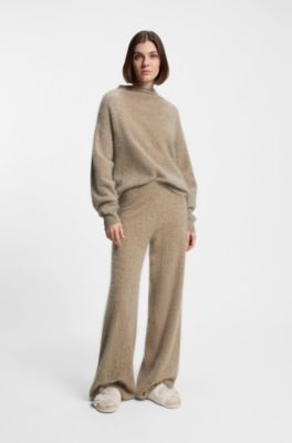 BOSS x Steiff buckled slides in teddy fabric, Natural
