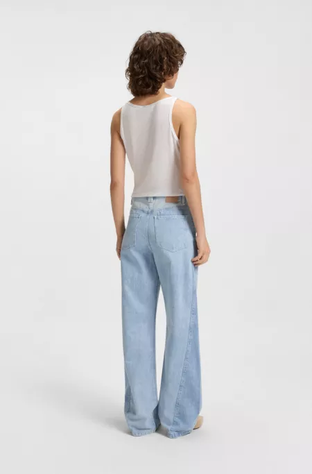 Wide-leg jeans in blue rigid denim with panelling