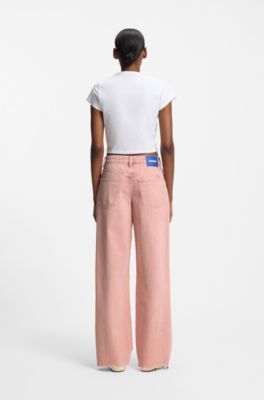 Loose-fit jeans in pink denim with frayed hems, light pink