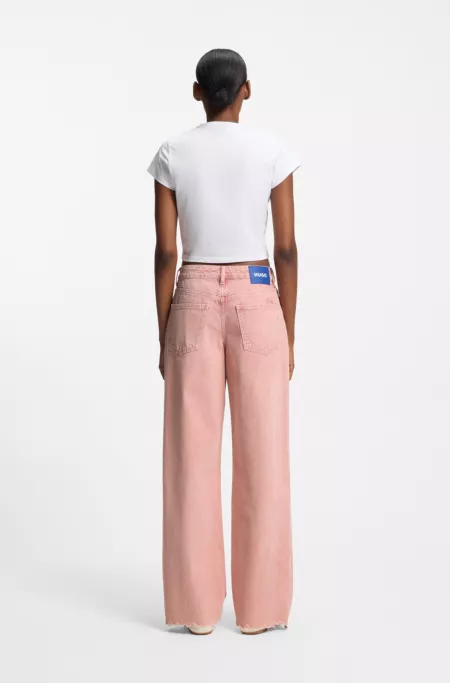 Loose-fit jeans in pink denim with frayed hems